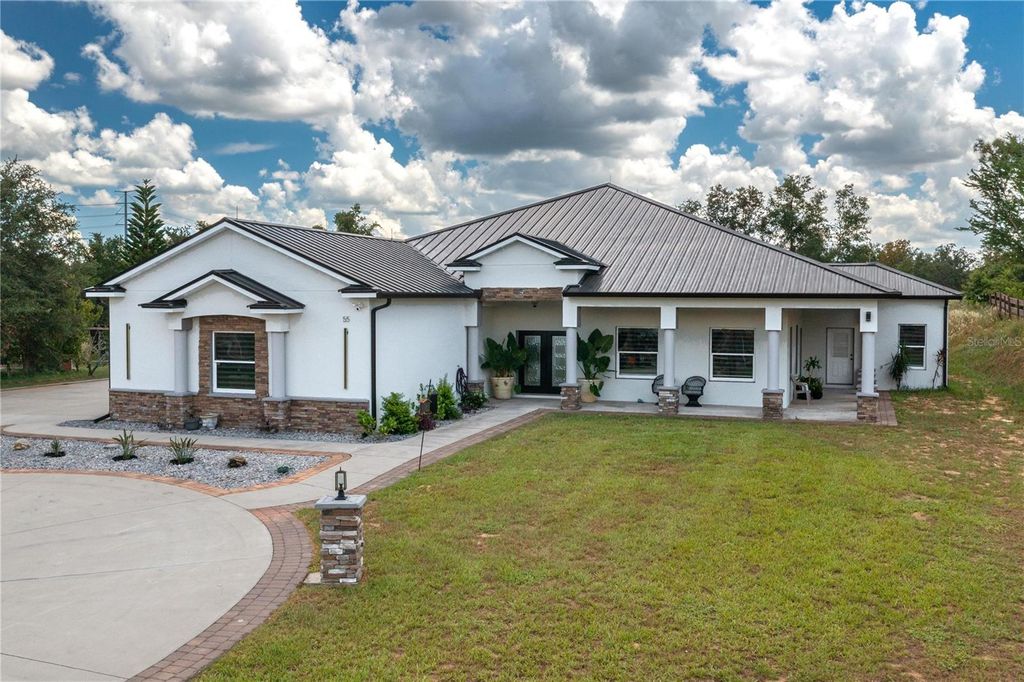 Photo of 55 Cattle Trail Drive, Haines City, FL 33844 (MLS # L4954089)