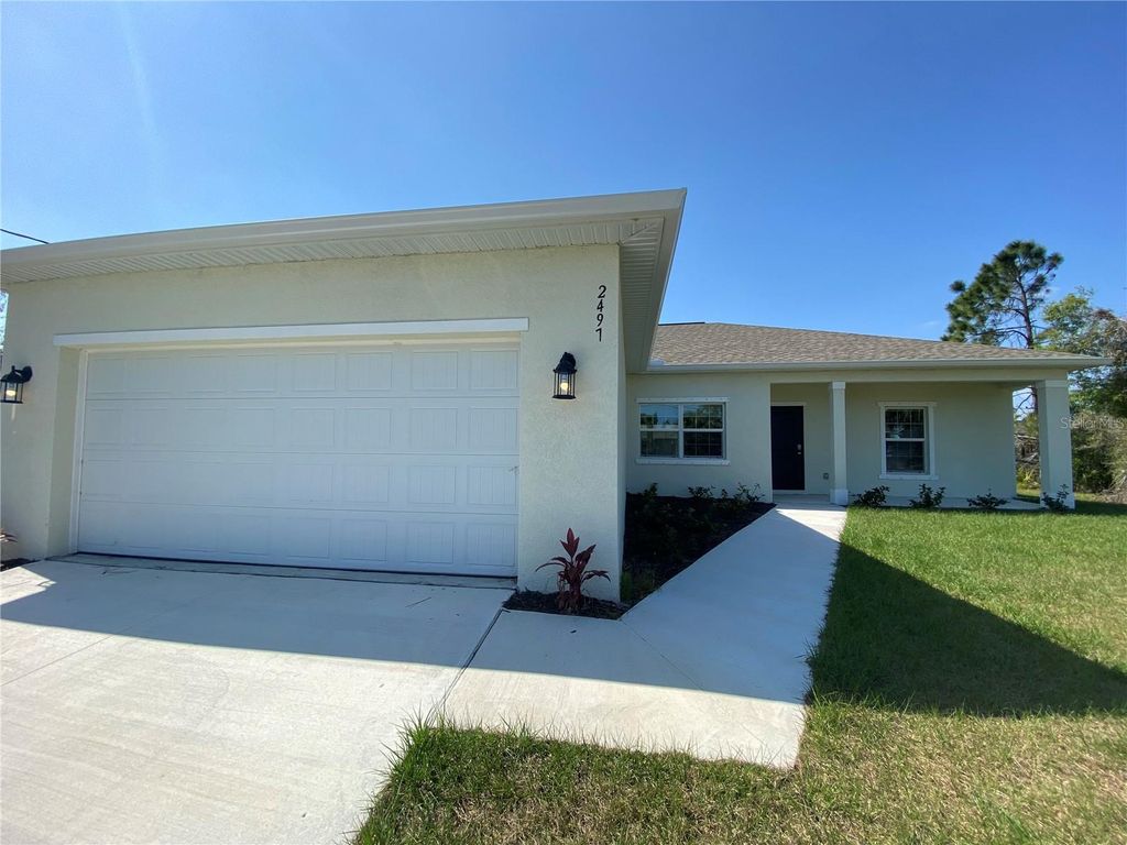 Photo of 2497 Courtland Avenue, North Port, FL 34286 (MLS # D6145634)