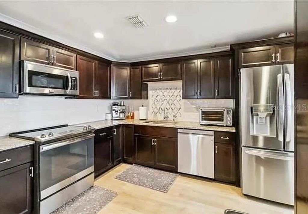 Photo of 5119 Old Cheney Highway, Orlando, FL 32807 (MLS # O6366111)