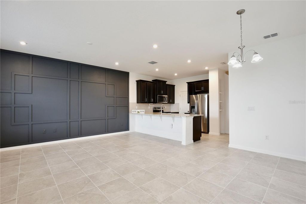 Photo of 10025 Eagle Rock Alley, Orlando, FL 32832 (MLS # O6396886)