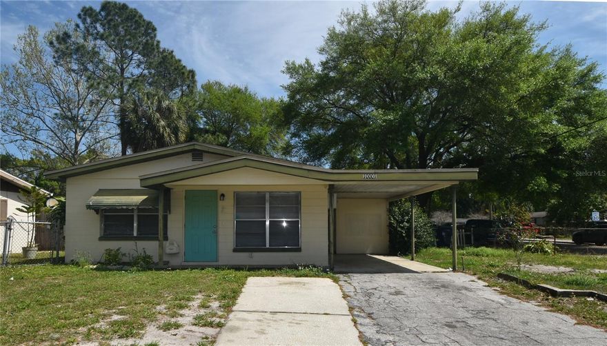 COZY LITTLE North Tampa bungalow has been fully renewed with FRESH PAINT and 'wood-look' vinyl flooring throughout! This home features a bright floor plan, covered carport and huge fenced in yard. Open kitchen with gas stove, dining and living room combo and shared bath with shower/tub. All 3 bedrooms are modestly sized. (The perfect tenant will need to be creative with smaller spaces with the bedroom fitting 'full to queen' sized beds comfortably.) Home has central heating and air and comes with washer/dryer hookups. Found in the Tampa Overlook neighborhood of Altman Colby, this location is just a short drive to USF, Veterans Hospital, Moffit Center, MOSI and Busch Gardens with easy access to I275. Also nearby is a wonderful variety of restaurants, stores and locally owned businesses.