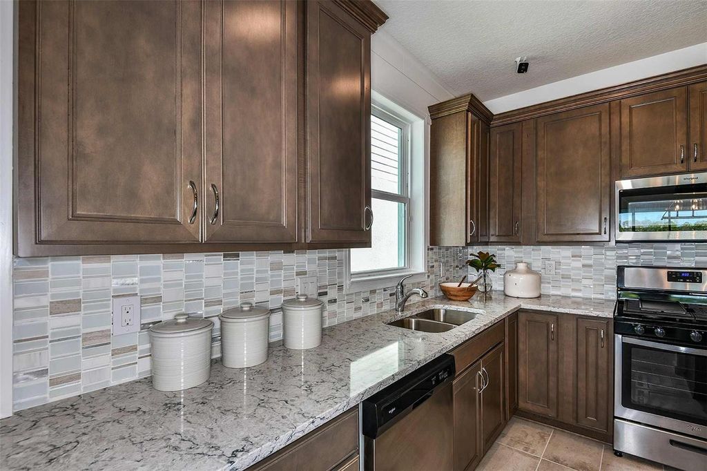 Photo of 6318 Dew Drop Loop, Saint Cloud, FL 34771 (MLS # O6370085)