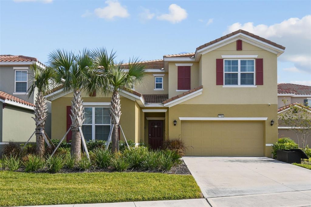 Photo of 7704 Oakmoss Loop, Davenport, FL 33837 (MLS # O6354099)