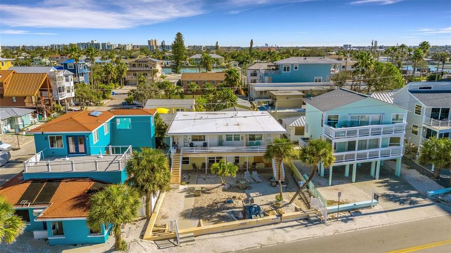 Location, Location, Location!  This 2 bedroom 1 and a 1/2 bath condo is only steps away from the Gulf sand. This unit is Gulf front, ground level and an end unit. The Gulf Spray Condominium is a small grouping of 5 detached buildings with private entrances and a courtyard.  2 designated parking spots are handy to your condo.  This condo has been recently renovated with new ceramic tile flooring, granite  countertops, stainless steel  appliances, new water heater and fresh paint.This Sunset Beach property is located near the park, playground, boat ramp, Pavillion, and beach to bay boardwalk.  Enjoy beautiful Florida sunsets from your own covered porch .Don't loose out on this great opportunity to purchase a piece of paradise. This property has a great rental history/