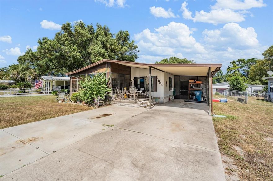 Welcome to 8304 Weatherford Ave, Brooksville, FL 34613! This 2-bedroom, 2-bathroom mobile home offers 1,056 sq ft of living space and the rare benefit of owning the land—a valuable feature in Brooksville. Located in a guarded 55+ community with its own golf course, this property blends comfort, convenience, and lifestyle.

Inside, the kitchen comes equipped with appliances and counters, making meal prep simple, while the cozy layout provides both comfort and functionality. While the home is full of potential, it does need some TLC, giving the next owner the chance to put their personal touch on this property.

Step outside and enjoy the best of Brooksville living. You’re just minutes from Weeki Wachee Springs State Park, perfect for kayaking, paddleboarding, or catching the iconic mermaid shows. Nature lovers will appreciate Withlacoochee State Forest and Chinsegut Hill Preserve, while golf enthusiasts have both the community course and nearby Hernando Oaks Golf & Country Club to enjoy. Relax with sunsets at Bayport Park, sip local wines at Strong Tower Vineyard, or head downtown to explore Brooksville’s historic square, boutique shops, and local dining favorites like Florida Cracker Kitchen and the Coney Island Drive-Inn.

With easy access to US-19 and the Suncoast Parkway, you can enjoy a peaceful neighborhood while still being within commuting distance of Tampa, Gulf Coast beaches, shopping, and entertainment. Whether you’re seeking a seasonal retreat, a downsizing opportunity, or a year-round home, this property offers comfort, lifestyle, and the chance to make it your own.

Don’t miss the opportunity to own land in a guarded 55+ golf course community and embrace the Florida lifestyle in Brooksville—schedule your showing today!