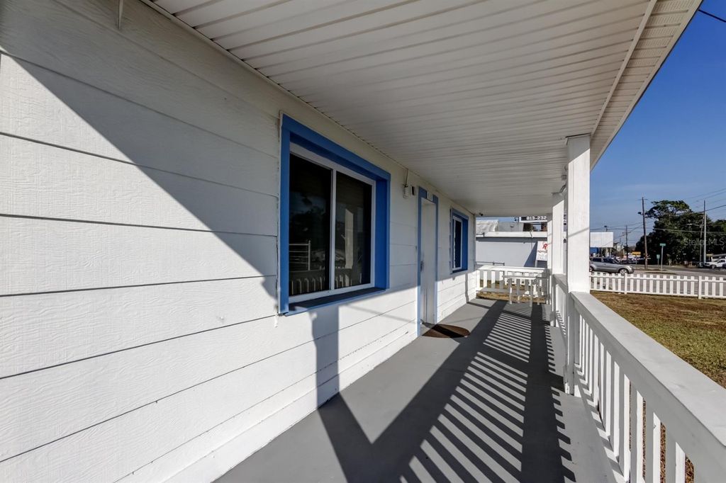 Photo of 4539 Mile Stretch Drive, Holiday, FL 34690 (MLS # TB8450043)