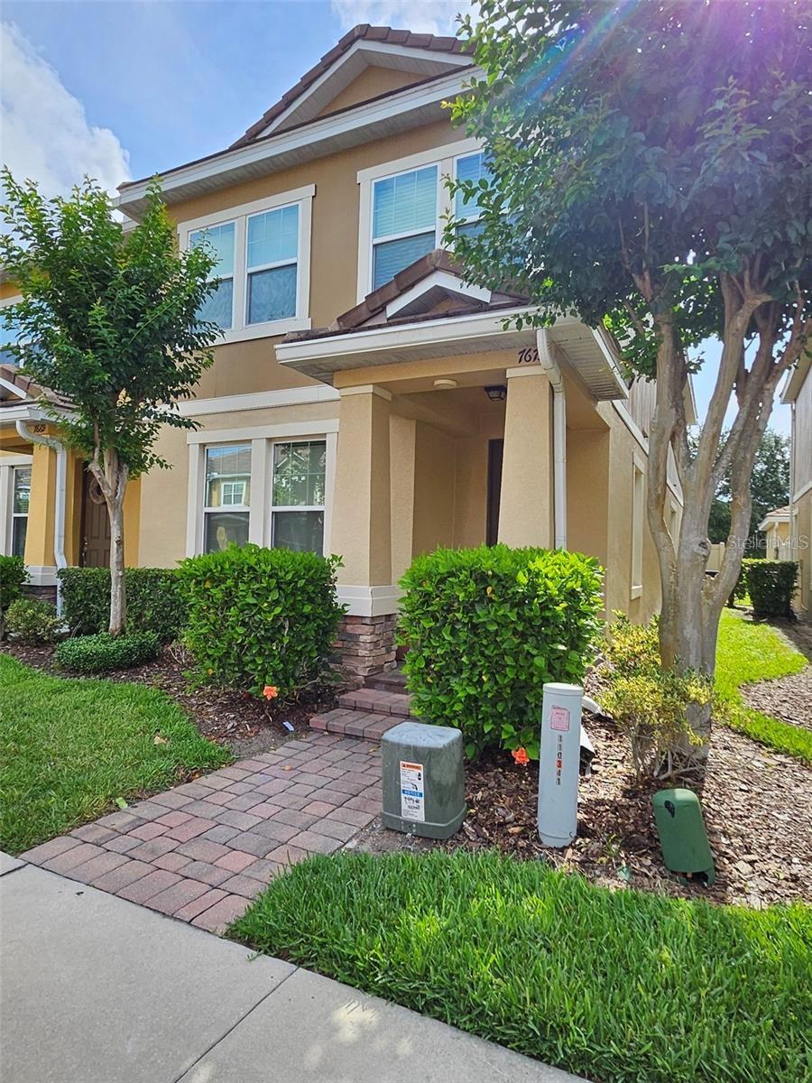 Move in ready! Rarely available, 4 bedroom/3 bathroom townhouse located in the sought after community of Lake Burden, Windermere. Property has tons of upgrades including wood floors, quartz counter tops in the kitchen, walk in pantry, 42" cabinets, stainless steel appliances, seperate garage in back that has private entry via the back door, private fenced courtyard, french doors, corner unit, bedroom with full bathroom downstairs. Property has been freshly painted and is ready for its next owner. This one wont last long. The clubhouse boasts a swimming pool, playground, picknic tables and lounge chairs. The community of Lake Burden has a fishing dock with bike and walking trails. Located conveniently super close to shopping and the theme parks.