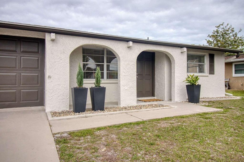 Photo of 9405 Gableton Lane, Port Richey, FL 34668 (MLS # TB8495813)