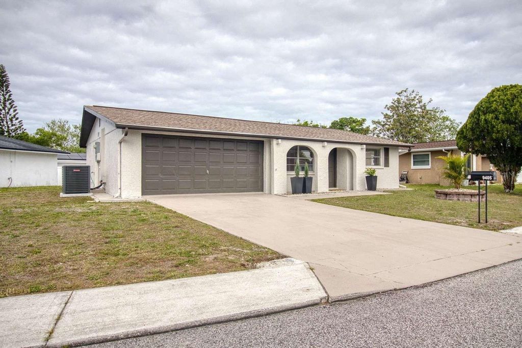 Photo of 9405 Gableton Lane, Port Richey, FL 34668 (MLS # TB8495813)