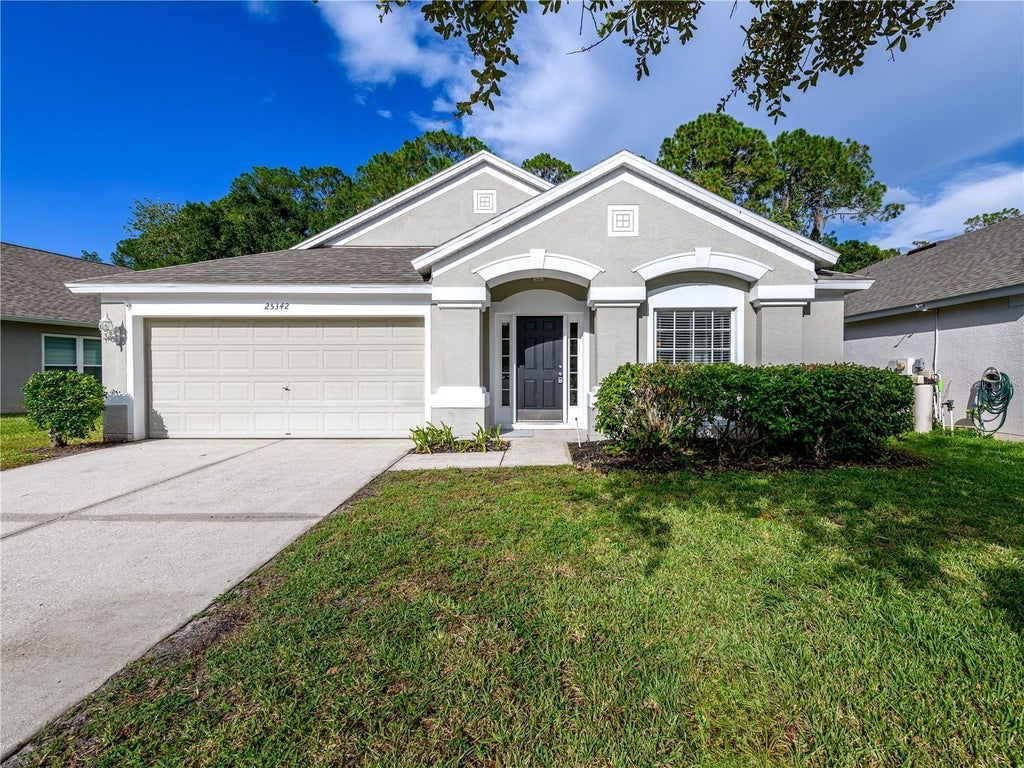 Photo of 25342 Lexington Oaks Boulevard, Wesley Chapel, FL 33544 (MLS # TB8528885)