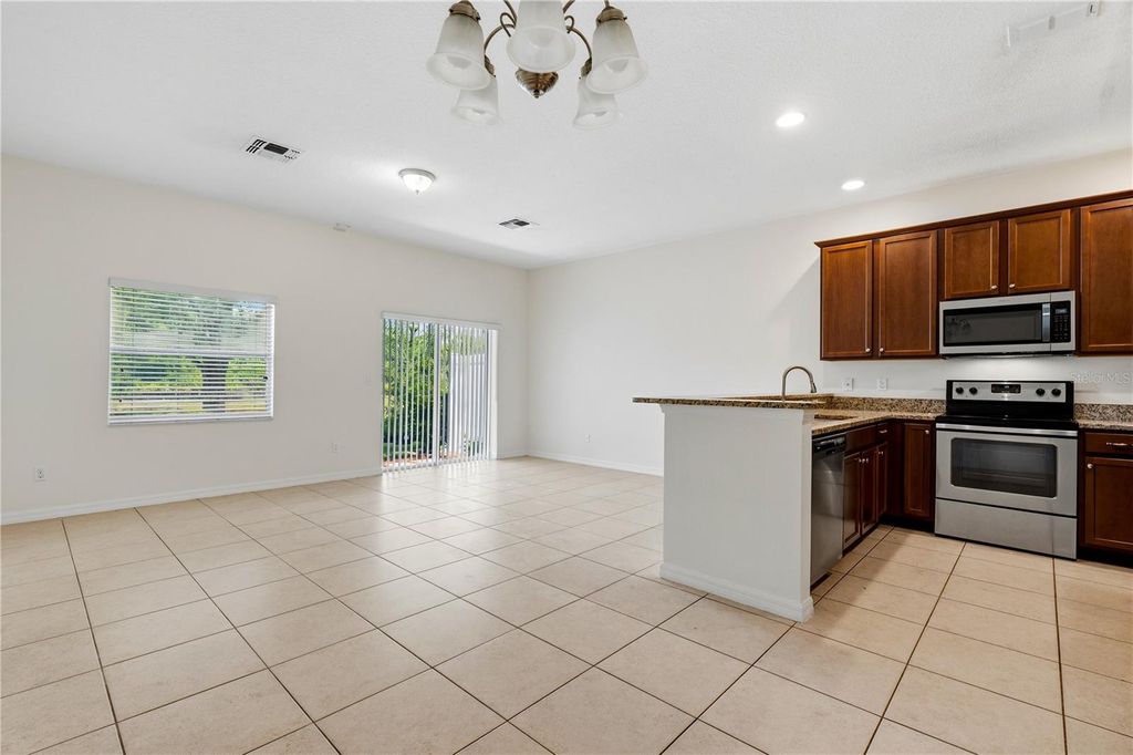 Photo of 1253 Honey Blossom Drive, Orlando, FL 32824 (MLS # O6408735)