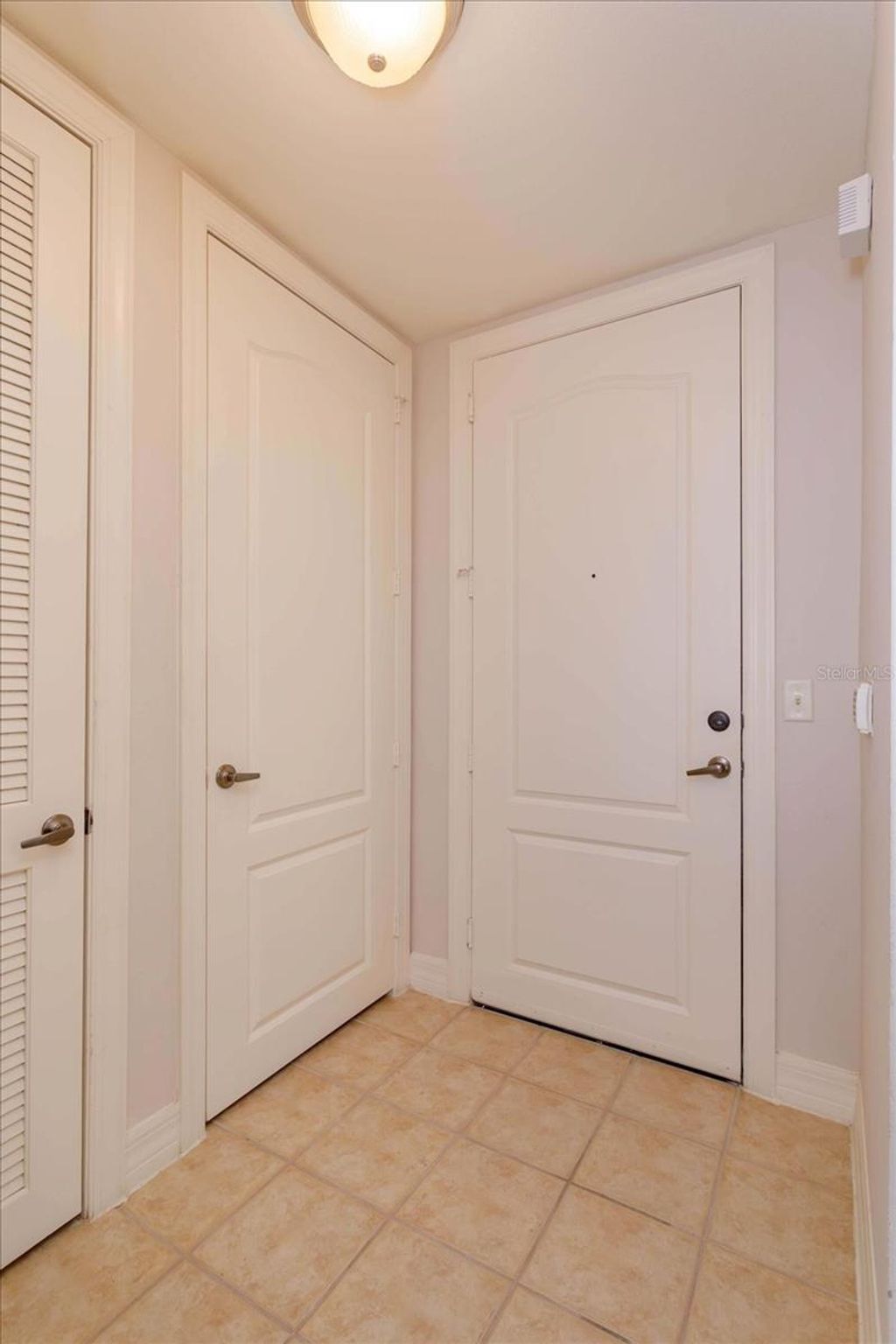 Photo of 509 Mirasol Circle #102, Kissimmee, FL 34747 (MLS # O6397354)