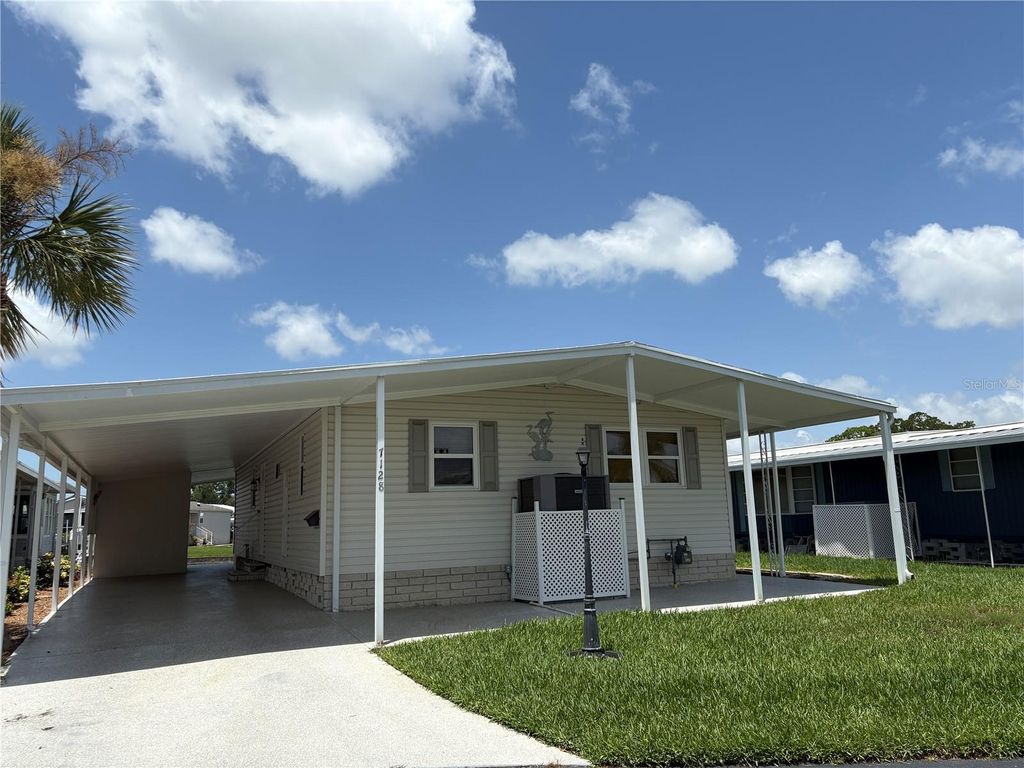 Photo of 7128 Mount Arlington Drive NE #414, St Petersburg, FL 33702 (MLS # TB8395389)