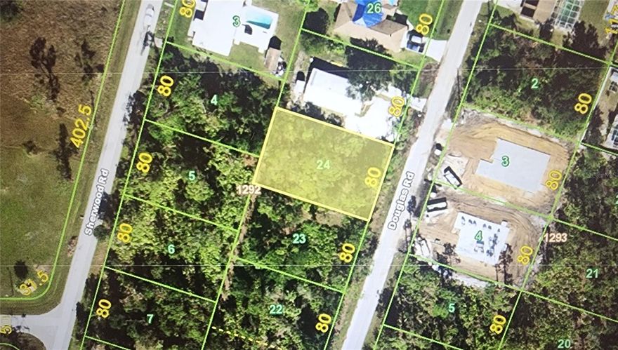 Spacious 80x125 lot in a quiet Port Charlotte neighborhood with public water available and no HOA. Surrounded by established homes and new construction, this parcel is close to shopping, dining, schools, and local amenities. A great opportunity to build your Florida dream home or secure a solid investment in a growing area!