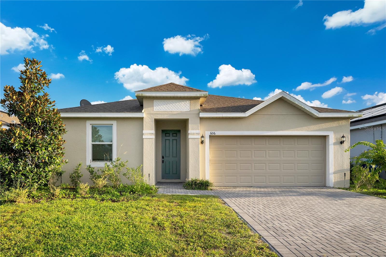 Welcome to this beautifully designed 4-bedroom, 2-bath home built in 2021, thoughtfully crafted with both comfort and functionality in mind. The open floor plan is enhanced by 9’4” ceilings and ceramic tile throughout the main living areas, creating bright, airy spaces perfect for everyday living. At the heart of the home, the kitchen showcases granite countertops, stainless steel appliances, and a spacious island with sink and bar seating. Cabinets provide plenty of storage, while the open layout keeps you connected to the dining and living areas. Sliding glass doors lead from the living room out to a patio with perfect pond views. The large primary suite features a walk-in closet and a private bath with double vanity and a stand-up shower. Three additional bedrooms, each with built-in closets, offer versatile space for family, guests, or a home office. A dedicated laundry room and attached 2-car garage add everyday convenience. This community offers a community pool and peaceful surroundings, with sidewalks and well-kept streets that make it easy to feel right at home. Being in Haines City, you’ll enjoy a quiet residential setting while still being close to shopping, dining, and major highways. Commuters will appreciate being in the middle of Orlando, Tampa, and world-famous attractions like Disney, Universal, and LEGOLAND. This home combines modern design and a central location! It’s a fantastic opportunity to build your future in Central Florida. Call us today to schedule a tour!