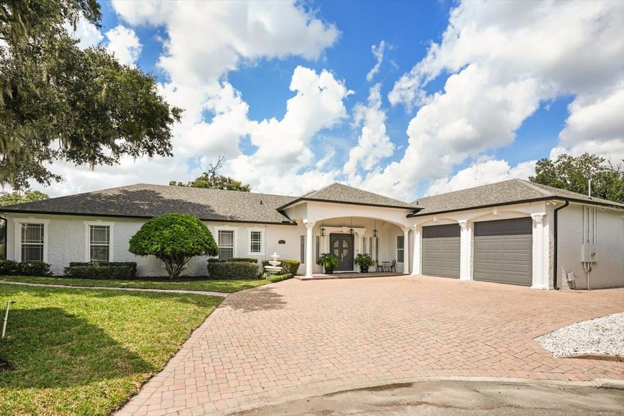 Nestled on a quiet cul-de-sac in the heart of Winter Park, this canal-front residence offers the perfect balance of elegance and lifestyle. With direct access to Lake Killarney, the home invites days filled with boating, fishing, and entertaining poolside.

Offering a total of 4,798 heated square feet, the property includes the main residence with 3,798 square feet plus a 1,000-square-foot detached guest house with a private entrance, kitchen, living area, bedroom, and full bath—ideal as an in-law suite or private retreat for guests.

Inside the main home, the living space unfolds across a single story with soaring ceilings, custom built-ins, and expansive gathering areas. The gourmet kitchen is a chef’s delight, featuring a gas cooktop, built-in oven, 42” cabinetry, and generous counter space for entertaining. A gas fireplace anchors the family room, while French doors open to the screened pool, patio, and expansive backyard.

The oversized primary suite feels like a retreat with its spa-inspired bath, oversized walk-in closet, and serene views of the pool and canal. Four additional bedrooms provide comfort for family or guests.

A 2-car garage with rear access makes boat launching easy, while zoned A/C, natural gas, and thoughtful updates ensure modern comfort. Located just minutes from Park Avenue, Rollins College, and downtown Orlando, this home offers privacy, convenience, and a waterfront lifestyle unique to Winter Park.