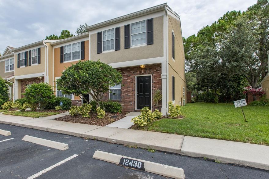 Come Live the Maintenance Free Lifestyle in Westchase! Extremely Well Maintained and Cared for Larger End Unit in the Popular Berkeley Square Subdivision. This Townhome Features Two Larger Bedrooms, Two Full Bath and a Half Bath on the Ground Floor Level. Open Floorplan Living Offers 1st Floor Kitchen Featuring Granite Counters Tops, Marble Tiled Flooring, Stainless Appliances Package with Newer Microwave, Dishwasher, Range and Real Wood Cabinetry. Main Living area features Newer Greyed Wood Tinted Laminate Flooring and Offers Easy Access to the Screened In Private Porch and Storage Closet. Dining Area and Living Room are Combined Which Offers Lots of Different Design Possibilities. Upper Level has 2 Master Styled Bedrooms with En-Suite Bathrooms. Additional Features Include Inside Laundry Room, Newer A/C Unit, Recently Remodeled 2nd Full Bath, Marbled Tiled Entry, Bathrooms and Kitchen Flooring, Newer Ceiling Fans and Light Fixtures. Easy Walking Distance and HOA Access to the Two Westchase Swim and Tennis Complexes, Two 5 Acre Parks Which Offers Basketball Courts, Youth Play Areas and Open Grass Areas Perfect for Jogging and the Pet Enthusiasts. Close to Westpark Village Which Offers Shopping, Restaurants, Wine Bar, Ice Cream Shops, Table Tennis and Movie In the Park Nights. Close to Publix, Local Restaurants All Within an Easy Walk From Berkeley Square. Easy access to Tampa International Airport and the Beaches. A+ Rated Schools.