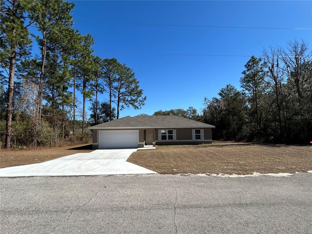 Photo of 12809 SW 83rd Terrace, Dunnellon, FL 34432 (MLS # O6390702)