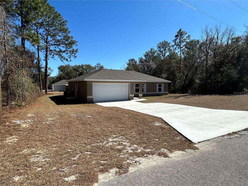 Photo of 12809 SW 83rd Terrace, Dunnellon, FL 34432 (MLS # O6390702)