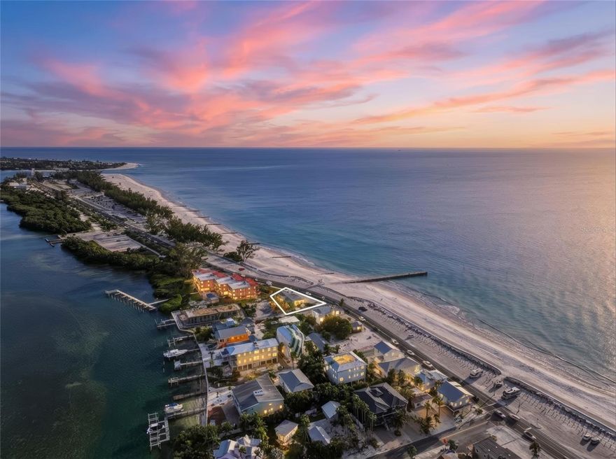 "Build to Suit" - Prime Buildable Lot Across from the Beach Offered strictly for land value, this is a rare opportunity to acquire the entire Gulf Reach Condominium site—three attached units with separate folio numbers, sold together as one redevelopment package in one of Bradenton Beach’s strongest short-term rental and redevelopment corridors. Build your primary home or an investment vacation rental on this lot. Zoning allows for 1–7-day vacation rentals. Don’t miss this great opportunity!

This property has historically operated as a successful VRBO/Airbnb location for many years, benefiting from consistent island demand, exceptional walkability, and immediate proximity to the Gulf beaches and the Bridge Street district. The address itself has long proven its desirability as a vacation-rental destination.

Seller will consider buyers who obtain appropriate approvals and require a due-diligence period to evaluate redevelopment feasibility, permitting, and design. This allows qualified investors and builders the opportunity to fully underwrite the project prior to closing.

A major upside of this site is its future view potential. With elevated new construction, a buyer can achieve full Gulf views as well as Intracoastal Waterway views, with the beach directly across the street and no structures obstructing sightlines—a rare and valuable combination that significantly enhances resale and rental appeal.

Additionally, this property is the second-to-last lot on this stretch of the island, offering a uniquely strategic location. It provides quick and convenient access heading north to Anna Maria Island or south toward Longboat Key and St. Armands Circle, making it ideal for both residents and vacationers seeking easy island mobility.

Utilities are already in place, and the site is surrounded by beaches, parks, boat ramps, fishing access, dining, shopping, and island amenities. Ideal for builders, developers, 1031 exchange buyers, or experienced short-term rental investors seeking a proven address with significant upside through elevated new construction in a supply-constrained barrier-island market.