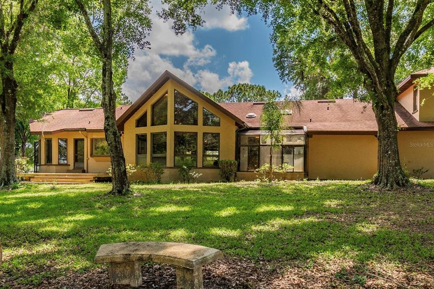 Set within 34± acres of protected Florida ranchland, this extraordinary two-home property offers a rare lifestyle designed for aviators, ranchers, farmers, and nature enthusiasts seeking privacy, open skies, and the freedom to live close to the land. Surrounded by working cattle ranches, crop farms, and wide-open countryside, the property benefits from a Florida land conservation protection that prevents future development, preserving the peaceful rural landscape and ensuring lasting privacy, natural beauty, and unobstructed views for generations to come.
At the heart of the ranch is a 3BR/3BA, 3,728 SF rustic lodge-style main residence overlooking a serene pond and rolling pastures. The home features soaring cathedral ceilings, a cozy wood-burning fireplace, and expansive windows that bring the beauty of the outdoors inside. For aviation enthusiasts, the property includes its own private airport — BURNTWOOD RANCH (FL43) — with a 2,600' x 150' engineered grass runway, private hangar, and enclosed observation deck, creating the perfect setting for pilots who value the convenience of flying directly home.
The ranch also offers excellent infrastructure for agricultural or equestrian use, including a pole barn with electric and water, open acreage for horses, cattle, or crops, and endless space to expand your vision of ranch living. A separate 2BR/1BA, 1,600 SF renovated guest residence with new roof and A/C provides flexibility for guests, caretakers, tenants, or multi-generational living.
Recent improvements include new interior paint, a new pool cage, and custom gated ranch entrance, enhancing both privacy and arrival experience. Free from HOA restrictions or aviation community limitations, this property offers true independence while remaining conveniently located within reach of major highways, dining, shopping, and the international airports of Orlando and Tampa.
Whether you’re landing your plane at sunset, tending livestock at sunrise, or simply enjoying the quiet beauty of preserved Florida ranchland, this one-of-a-kind estate offers an authentic ranch lifestyle where nature, aviation, and privacy come together in perfect harmony.