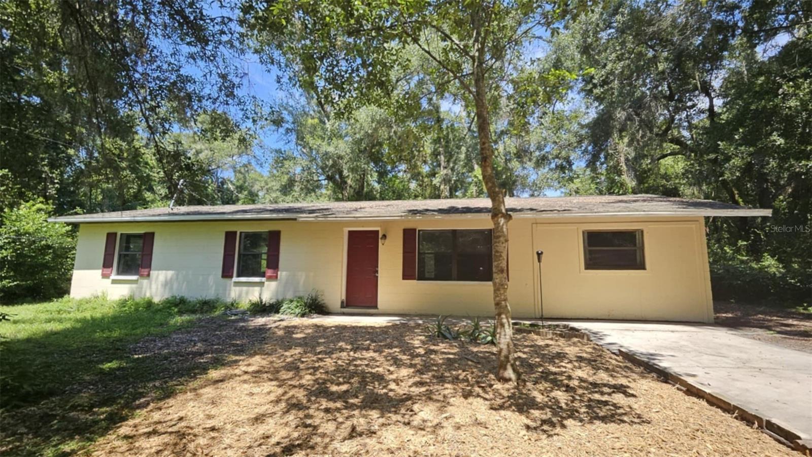 Tucked away on just over an acre, this 3 bedroom, 2 bath home offers the perfect blend of nature and convenience. Located just outside of Gainesville, off of Archer Rd., shopping, restaurants, and entertainment are less than 15 minutes away. With an upgraded kitchen, featuring granite countertops, as well as a large bonus room, a little love and attention is all this home needs to make it your own.
Clay Electric and 2017 HVAC are an added bonus. Schedule a showing today!