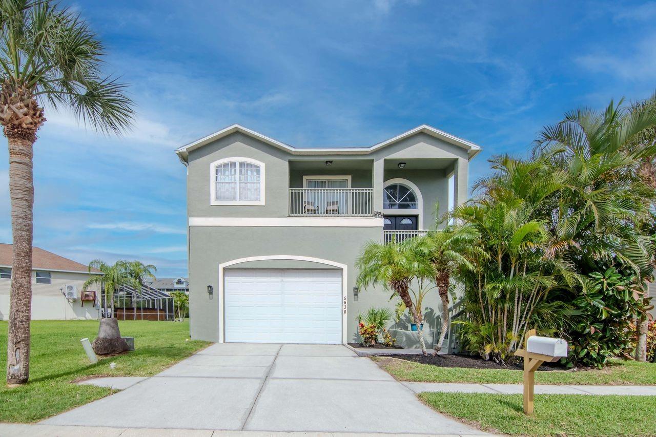Welcome to your dream home in the highly sought-after waterfront community of Gulf Landings! This stunning 4-bedroom, 3-bathroom residence with a bonus room and split-level layout offers the ultimate in Florida living—perfectly blending elegance, functionality, and resort-style amenities.
Step inside and be greeted by an open floor plan that seamlessly connects the spacious living and dining areas to a gourmet kitchen featuring granite countertops, stainless steel appliances, a large walk-in pantry, and plenty of room to entertain. The primary suite is a tranquil retreat complete with a spa-like bathroom boasting a standalone soaking tub, quartz countertops, and luxurious finishes.
Outdoor living is at its best with three expansive balconies—one overlooking the front canal and two with views of your private pool and spa. The lower level features a second living room, a bonus room, a bathroom, and an additional bedroom—ideal for guests, multi-generational living, or a home office setup. Roof is only Three years old (2022), and A/C installed in 2021.
Calling all hobbyists and boating enthusiasts: this home features a dream garage with ample space to store a boat, cars, and all your toys, plus a handyman’s dream workshop with built-in workbenches and extensive storage. Professionally landscaped and beautifully maintained, the property offers both curb appeal and privacy. And when you're ready to explore the neighborhood, Gulf Harbors delivers with exclusive resident amenities including: a golf cart friendly community, two private boat ramps, private beach access, a clubhouse with boat slips and a pool, and the ability to rent the clubhouse for events.
Centrally located and in close proximity to shopping, dining, and vibrant Downtown New Port Richey, which features restaurants, brewery's, local shopping, and a beautiful river front park.
The lot to the South of the home (to the right of the home) is owned by the sellers and is available for purchase as well.
Whether you're seeking everyday comfort or weekend adventure, this home offers it all. Live the Florida lifestyle you’ve always dreamed of—schedule your private showing today!
