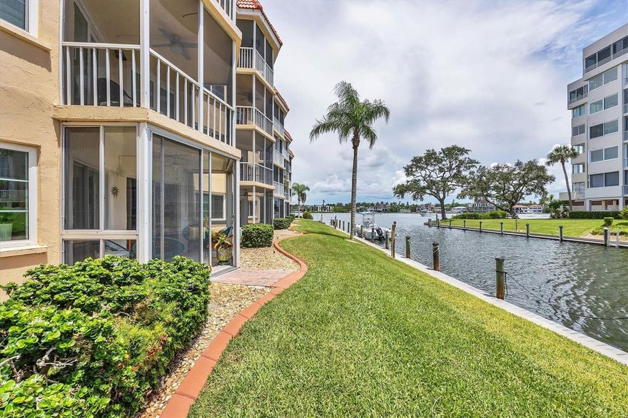 SIESTA HARBOR...55+...BEAUTIFUL CANAL & Intercoastal Water Way VISTAS with boats slowly idling by and YOU HAVE BEACH ACCESS. BRING YOUR BOAT up to 30' because it only costs $1,000 ANNUALLY to berth your boat! BUT WAIT till you see this TOTALLY RENOVATED BEAUTIFUL 1 bedroom 2 full bathroom condo! NEW, NEW, NEW...everything is new...Ceramic tile flooring, baseboards, interior doors & hardware, impact windows throughout, Popcorn removed and new texture ceilings, New electric plugs and switches, new kitchen with floating cabinetry, Quartz counters, new appliances, High end and modern lighting fixtures throughout, updated bathrooms also with floating vanities, incandescent lighting mirrors, new shower, New hot water tank, HVAC is only 2 years old, etc. You have plenty of storage as the bedroom has 2 closets (one is walk in), linen closet, Hall coat closet, pantry closet AND just outside your front door is a storage room for your bikes etc.! Amenities include a beautiful pool overlooking the water, shuffleboard, rec center, pier for boat watching and gatherings, tandem boat docks, fitness center FREE laundry on 2nd, 3rd and 4th floors PLUS FOB access to the beach across the street @ Crescent Arms. ALSO you have one DESIGNATED covered carport parking spot with plenty of guest parking #537. Outdoor grilling SPOT. Rental friendly but no pets except authentic guide dogs. PRICED BELOW MARKET AT $429,900