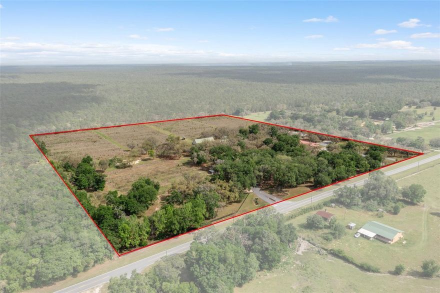 There is so much to see here and so many possibilities! This is an INCREDIBLY RARE opportunity to own multiple buildings with varied use, on a total of 37.33 acres, zoned both GNC (11.37 acres) & AGRMH (25.96 acres). This property includes a Massive Primary Residence (9312 sf/total) complete with a 4 car attached garage & an additional 4 car Detached garage/workshop (2000sf), Contractor Trailer, Storage Rig & Pole Barn all on 26 acres zoned AGRMH. This sale also includes a fully equipped Commercial Restaurant (8603 sf/total) & Elegant Event Venue (9586 sf/total) on 11+ acres zoned GNC. Over 20 acres of this property was once a thriving blueberry farm (64 rows), irrigated by a diesel well w/turbine gear drive motor. Irrigation system pumps 2300 gals/min w/a 3406 cat engine that powers a 12 inch well pump. Citrus County is primed for growth & this is a PRIME location! Two sides of this property are bordered by the State Forest, w/1268 ft of frontage along HWY 491,& less than 5 miles from the Suncoast Parkway. The County is currently expanding its infrastructure to support the expected 30k+ additional residents predicted to move to the area by 2030. You won't want to miss this unique opportunity!