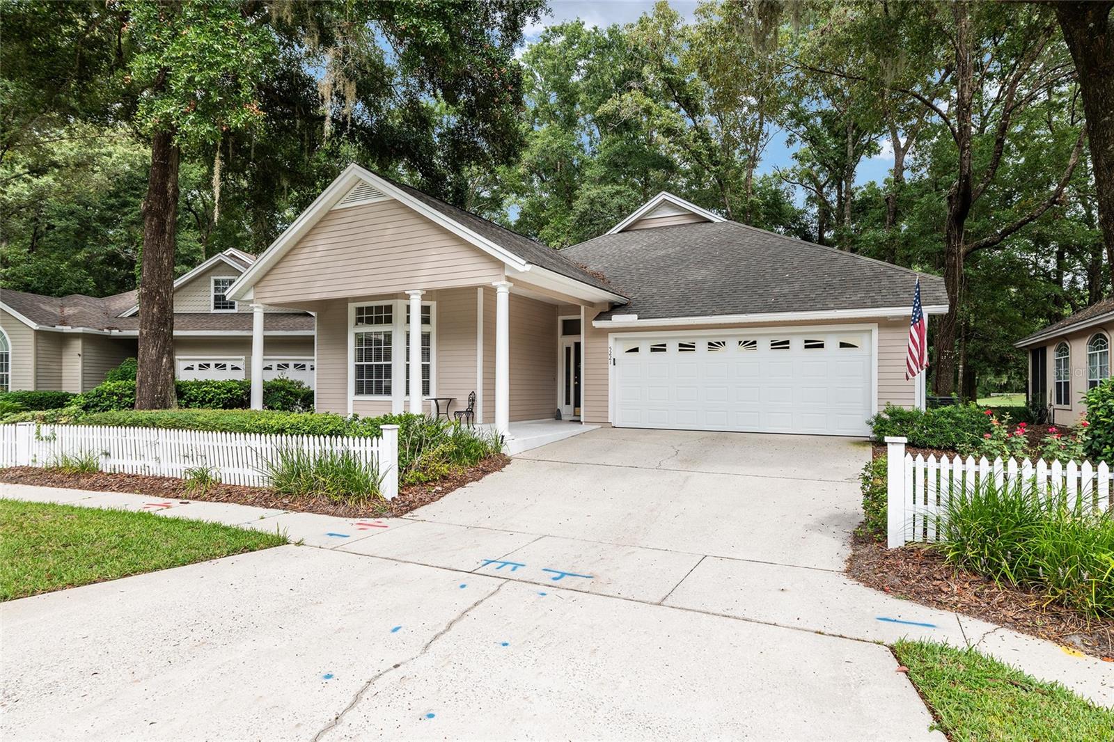 Beautifully maintained 3 bedroom 2 bath home located on the 5th fairway of Haile Plantation's Hawkstone Golf and Country Club. Enjoy the views of the fairway and woods from the 10 x 30 foot screened in back porch. Entertaining is a breeze with a large open kitchen with all wood cabinets, granite counter tops and stainless appliances. This home has such a spacious feeling with 10ft ceilings throughout, a gas fireplace in the great room, newer planked wood floors and a gorgeous view through the french doors to the golf course. This home is a must see if you like a view with privacy and close to everything that Gainesville has to offer.