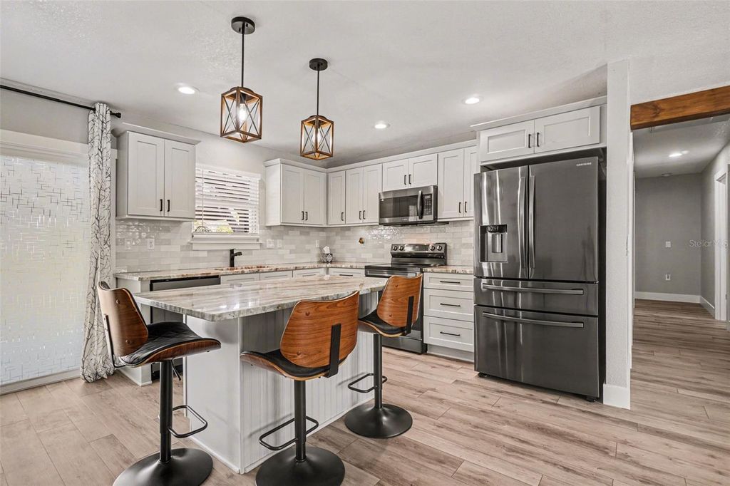 Photo of 410 E Henry Street, Punta Gorda, FL 33950 (MLS # C7522680)