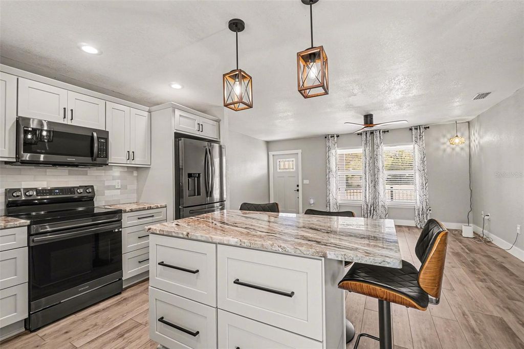 Photo of 410 E Henry Street, Punta Gorda, FL 33950 (MLS # C7522680)