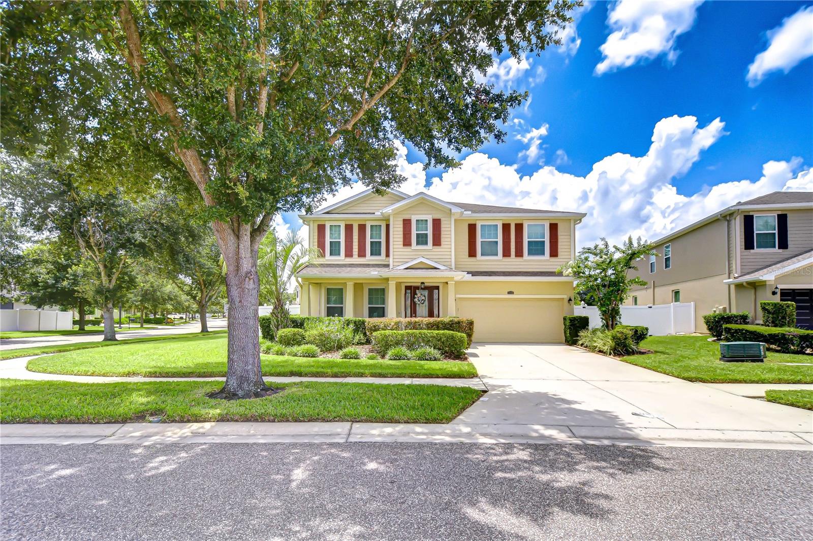 Welcome to The Enclave at Terra Bella! This Corner-Lot features Over 2,700 Sq Ft of Refined Living! Where timeless design meets everyday comfort in one of the area's most sought-after communities. Nestled on a generous .20-acre corner lot, this stunning two-story residence offers over 2,700 square feet of beautifully appointed living space, designed to impress from the moment you arrive. Step inside and fall in love with the seamless flow of the main level, featuring porcelain tile flooring throughout, quartz windowsills, and abundant natural light. The formal living and dining rooms are perfect for entertaining, while the chef’s kitchen is a true showstopper—boasting granite countertops, stainless steel appliances, an oversized pantry closet, and ample room to cook and gather. A convenient half bath is tucked away downstairs for guests. Upstairs, the spacious primary suite offers the perfect retreat, complete with a sitting area, huge walk-in closet, and a luxurious en-suite bath. Three additional large bedrooms, a full guest bath with granite counters, and a flex space ideal for a home gym, game room, or media area round out the second floor. Step outside to enjoy Florida living at its finest. The screened lanai opens to a fenced backyard with plenty of space for grilling, gardening, or hosting unforgettable backyard gatherings. As part of the Terra Bella community, you’ll enjoy resort-style amenities including a sparkling community pool, clubhouse, sidewalk-lined streets, and convenient access to shopping, dining, and commuter routes. If you’ve been searching for space, style, and community—all in one—this home checks every box. Don’t miss your chance to own a piece of The Enclave’s charm. Schedule your private tour today!