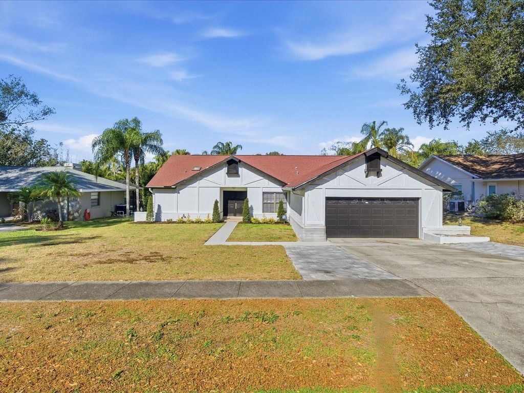 Photo of 4703 Orange Grove Way, Palm Harbor, FL 34684 (MLS # TB8471423)