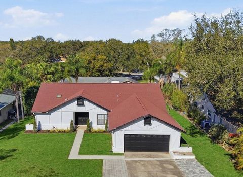 Photo of 4703 Orange Grove Way, Palm Harbor, FL 34684 (MLS # TB8471423)