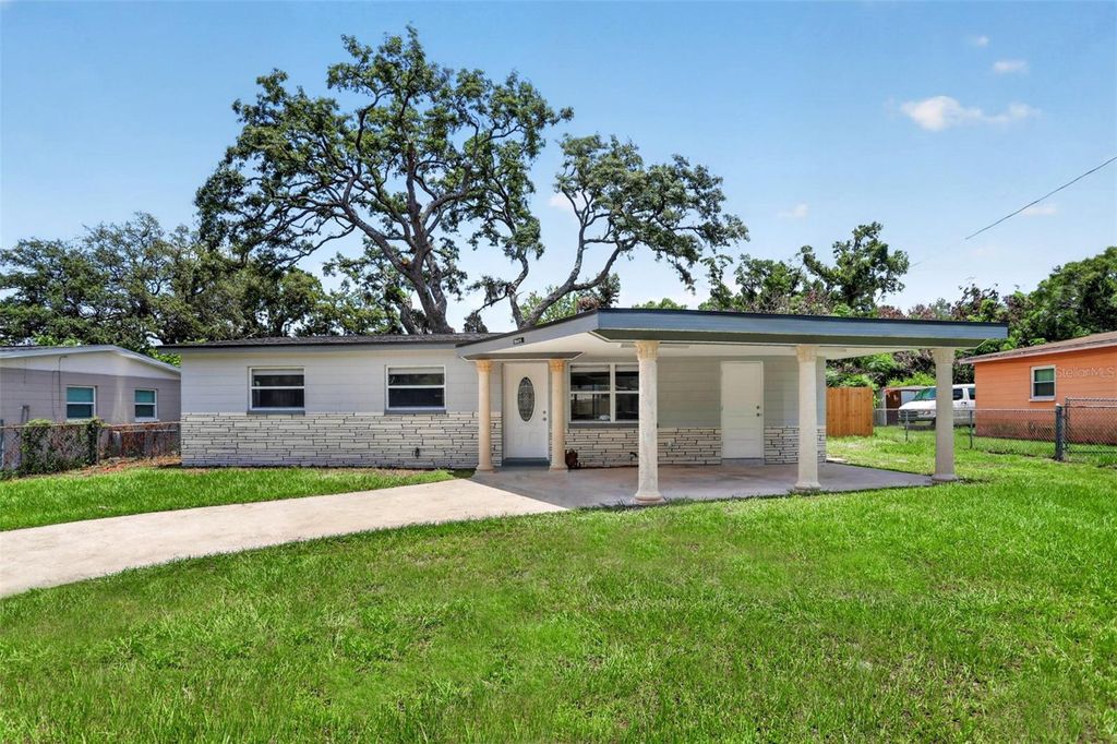 Photo of 10405 N 22nd Street, Tampa, FL 33612 (MLS # TB8521689)