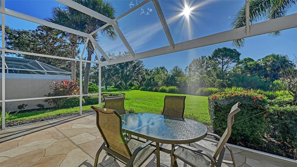 Photo of 7541 Pesaro Drive, Sarasota, FL 34238 (MLS # A4664322)