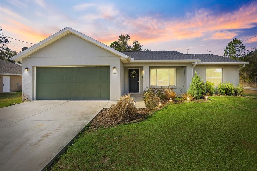 Beautiful 3-bedroom, 2-bath home located in peaceful Ocklawaha with no HOA and a true county-living feel. Built in 2022 and situated on a .24-acre corner lot, this home offers modern finishes and move-in-ready condition. Interior features include luxury vinyl plank flooring throughout, granite countertops throughout the home, and a functional open layout with great natural light. The kitchen provides ample counter space and flows seamlessly into the main living area. Recent updates include a brand new AC (2025) and water softener. The property also features a 2-car garage for convenience and storage. Enjoy quiet surroundings while remaining within reasonable distance to Ocala, Lake Weir, and area amenities. A great opportunity for buyers seeking newer construction without HOA restrictions.