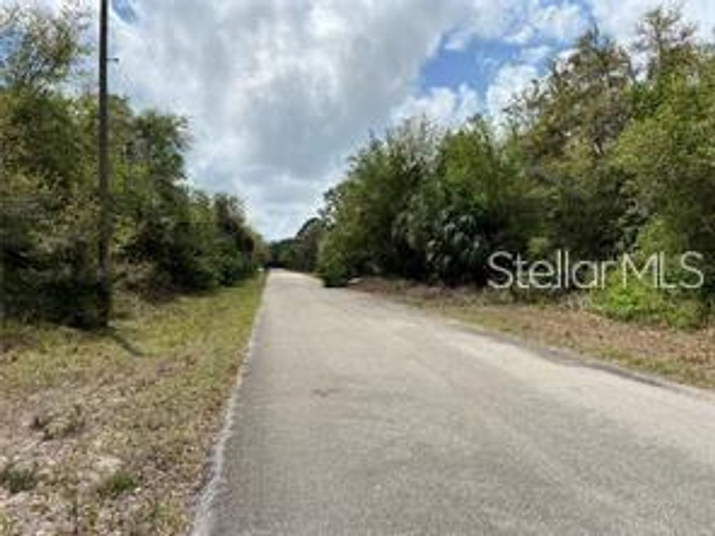 Photo of 3399 Jewel Street, Port Charlotte, FL 33948 (MLS # C7522346)