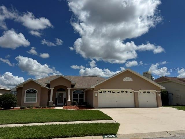 Photo of 8533 Coral Creek Loop, Hudson, FL 34667 (MLS # W7889062)