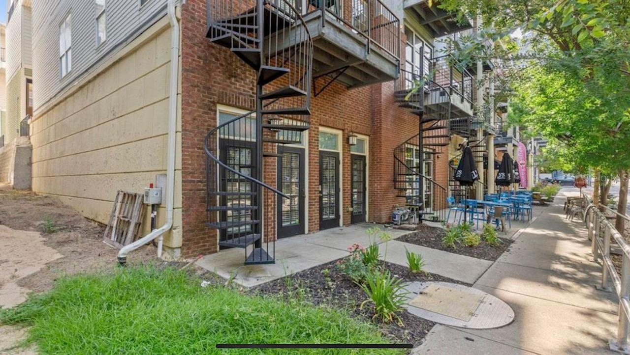 This First floor unit is located in The Cloisters of All Saints and is a great investment opportunity. Located in a growing neighborhood walking distance to the new FSU business school and has flex zoning for light commercial or residential use. This unit is minutes away to FSU campus, College town, and the stadium. Open industrial style unit with concrete floors and high ceilings. Unit could be used for a bar/restaurant or built out for residential use. Full kitchen includes dishwasher, stove, combo washer/dryer.