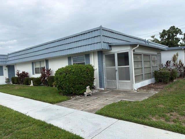 Photo of 1901 Andover Way #26, Sun City Center, FL 33573 (MLS # TB8519879)