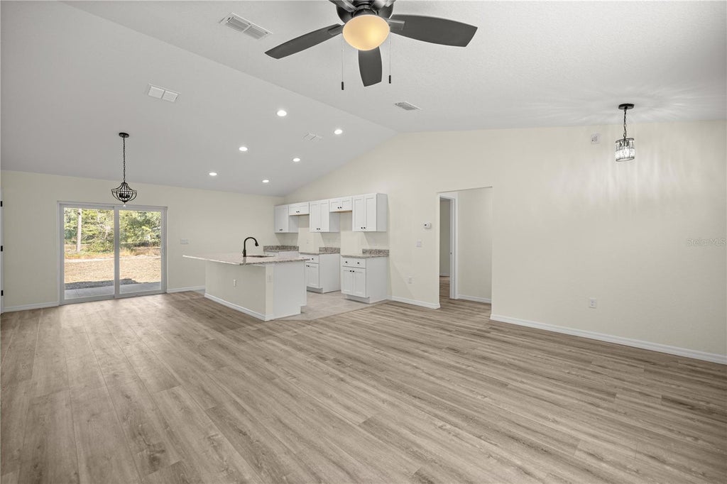 Photo of 40 Bay Drive, Ocklawaha, FL 32179 (MLS # OM732112)