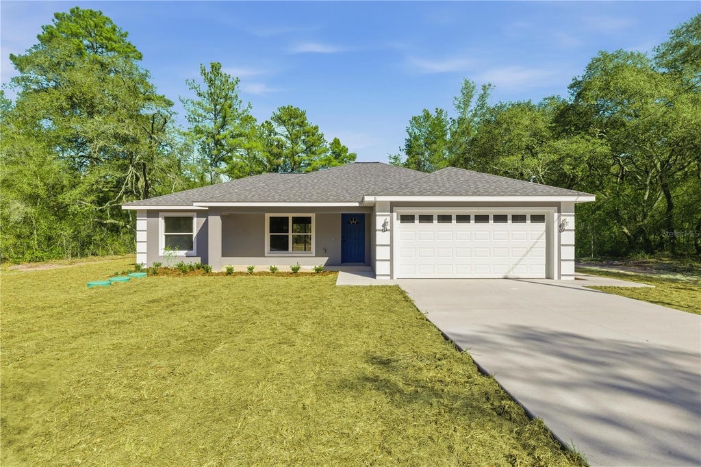 Photo of 40 Bay Drive, Ocklawaha, FL 32179 (MLS # OM732112)