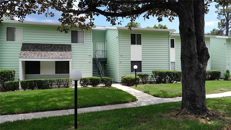 Second floor 1 bedroom, 1 bath, NOT in a flood zone, "fixer upper" condo in desireable Live Oak Village. This unique unit not only overlooks the golf course, it has a long view of the golf course. Tree lined streets provide ambiance for that stroll, bike, or golf cart ride. Silver Springs Community center is about a five minute drive, boasting billiards, workout room, several swimming pools, small library, and more. It's a must see. Conveniently located near major retailors, pharmacy, local hardware store, strip mall. The community has a mixture of seasonal and year round residents. Easy commute to downtown Ocala and The Villages. This is a good opportunity for someone who is looking to fix up and make their own.