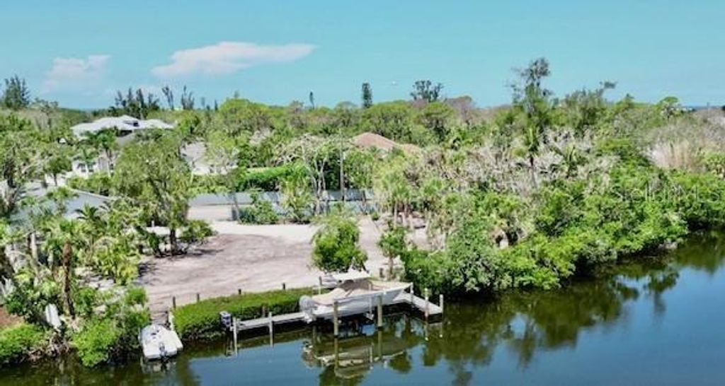 Photo of 7233 Midnight Pass Road, Sarasota, FL 34242 (MLS # A4660300)