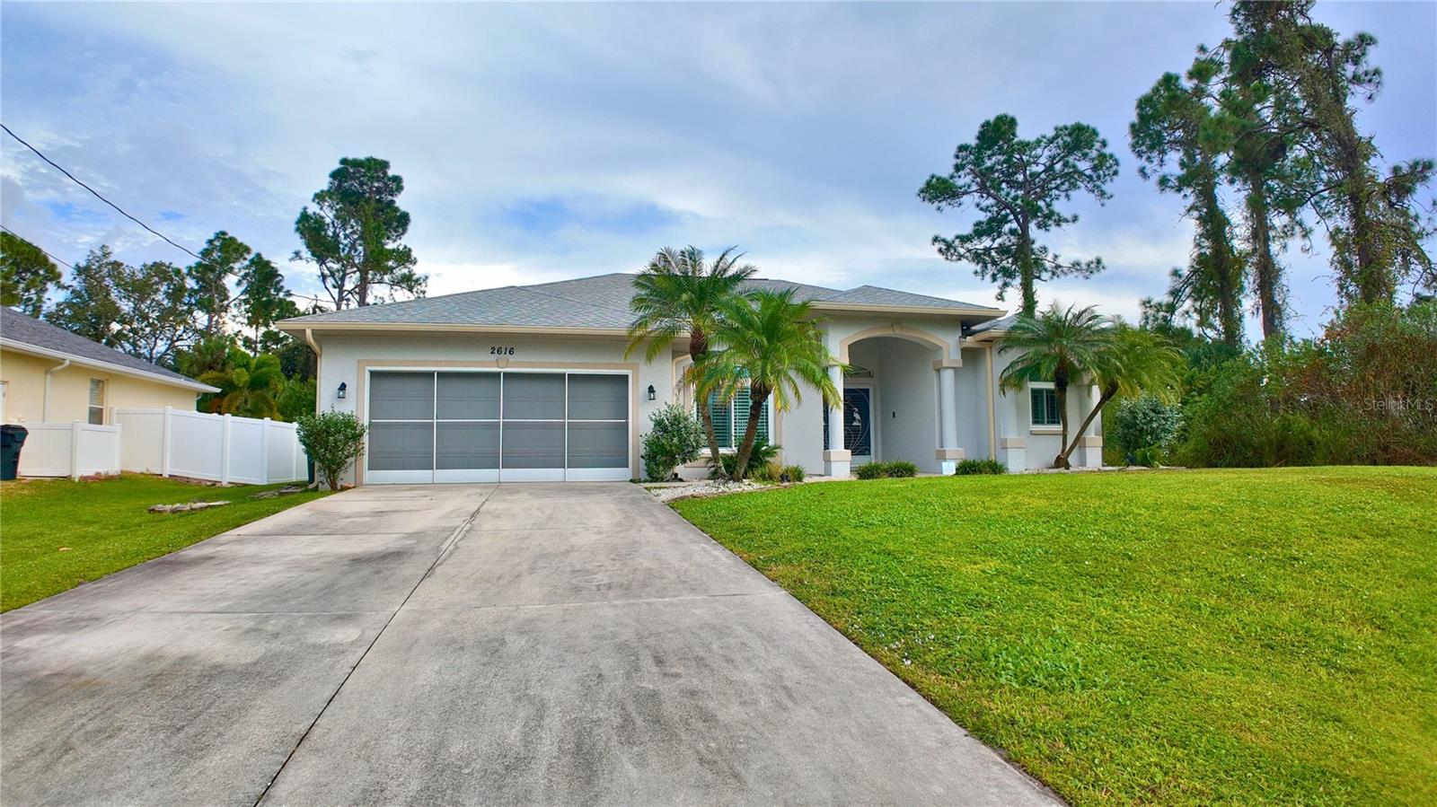 Welcome to 2616 Westberry Terrace, a well-maintained 3-bedroom, 2-bath home offering 1,726 square feet of thoughtfully designed living space on a 10,000 sq ft lot in a quiet North Port neighborhood. Inside, you’ll find a spacious open layout with recent interior upgrades, neutral finishes, and generous natural light. The primary suite features two walk-in closets and an updated en-suite bathroom, providing a comfortable and private retreat. The main living area opens directly to a screened lanai and pool area, creating a seamless indoor-outdoor connection that makes everyday living and entertaining effortless. Additional features include a screened two-car garage, dedicated storage shed, and well-landscaped yard offering both privacy and functionality. Located near shopping, dining, and I-75 access, this home offers a balance of convenience and comfort that appeals to both local and out-of-state buyers seeking quality construction and move-in-ready condition in one of North Port’s most established areas.