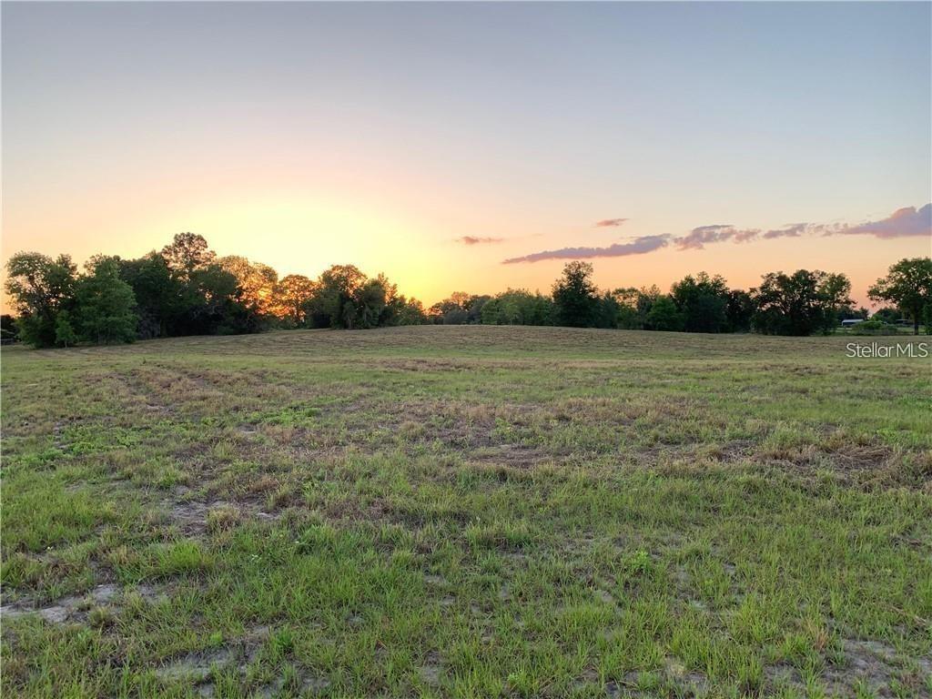 This beautiful, cleared five acre farm site is the perfect place to enjoy a quiet sunset. Located just twelve minutes to the World Equestrian Center and eightteen minutes from HITS. The homesite sits atop a slight roll with good drainage and the entire acreage is high and dry. Classic Farms is a pretty neighborhood of large acreage lots with paved road access.
