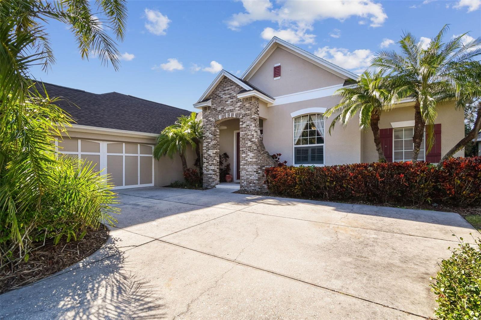 Welcome to Waterchase - Tampa’s premier 24 hour secured & gated full amenity family based community next to BEST SCHOOLS with bus service from the clubhouse! Over 4,000 SQ.FT., 5+ BEDROOMS, POOL, GAME ROOM with BILLIARD TABLE & HOME THEATER located in Tampa's Best Rated Full Amenity Community. Bring your family, little ones or just enjoy living like it's an all-inclusive resort. Your new large home is located on a QUIET CUL-DE-SAC just a SHORT WALK to the Club House, Community Pools, Gym, Activities and newly remodeled tennis/pickleball/basketball courts! LITTLE ONES PLAY SAFE outside this home without worrying about car/golf cart/scooter traffic. Brand NEW ROOF installed October, 2024! This home is move-in ready with upgraded tile floors throughout the two floors. 5 bedrooms, private office (or 6th bedroom), 3 full bathrooms, dining room, living room, kitchen on the first floor, large bonus GAME ROOM with POOL TABLE and custom HOME THEATER on the second floor. Open and bright floor plan, upgraded kitchen and extra large Master Bedroom Suite with Office/Sitting Area and Walk-In Built Out Closet! First level has a private spacious office or 6th bedroom with double glass doors, dedicated open dining room and kitchen with custom backsplash, upgraded granite counters and breakfast area. Off the kitchen you will find your open concept living room. SUPER LARGE MASTER SUITE privately situated with a sitting/work area and a door leading to the lanai to enjoy a private morning or quiet evening outside. The master bathroom has dual sinks, large walk-in shower, tub and a CUSTOM WALK -IN MASTER CLOSET with dual hanging racks and shelving for optimized space. Four other bedrooms, two bedrooms sharing a full Jack & Jill, double sink bathroom and two bedrooms with a dedicated full bathroom. Upstairs level is where the fun never ends - HUGE BONUS ROOM featuring a full-size billiards/ping pong table and a half bath. Then enter into your own built out TWO LEVEL HOME THEATER that seats seven in reclining chairs, pre-wired for surround sound and an overhead projector! Second floor can easily be converted to a private office, another bedroom or an in-law suite. The home has upgraded plantation shutters throughout. There is an attached two car garage. The home is equipped with a complete hurricane shutter kit. Waterchase is a top family based community in Tampa with 24hr attended Security, gated entrances, fabulous amenities including a Multi-Million dollar clubhouse, two resort-style swimming pools, a two story water slide, lighted tennis/pickleball/basketball courts, fitness center, athletic field, and a covered tot lot and playground. With a full time community activities director, afterschool programs, and famous Halloween/Christmas and other celebrations in Tampa, this IS the absolute place for your family! Conveniently located walking/biking distance to top-rated elementary (Bryant) & middle school (Farnell), bus service to Sickles High School from the clubhouse, 25 minutes to Tampa International Airport and 45 minutes to the most beautiful beaches in the country! Plenty of restaurants, shops and Costco nearby. Don't miss this larger home in Waterchase on a cul-de-sac, a rare find!