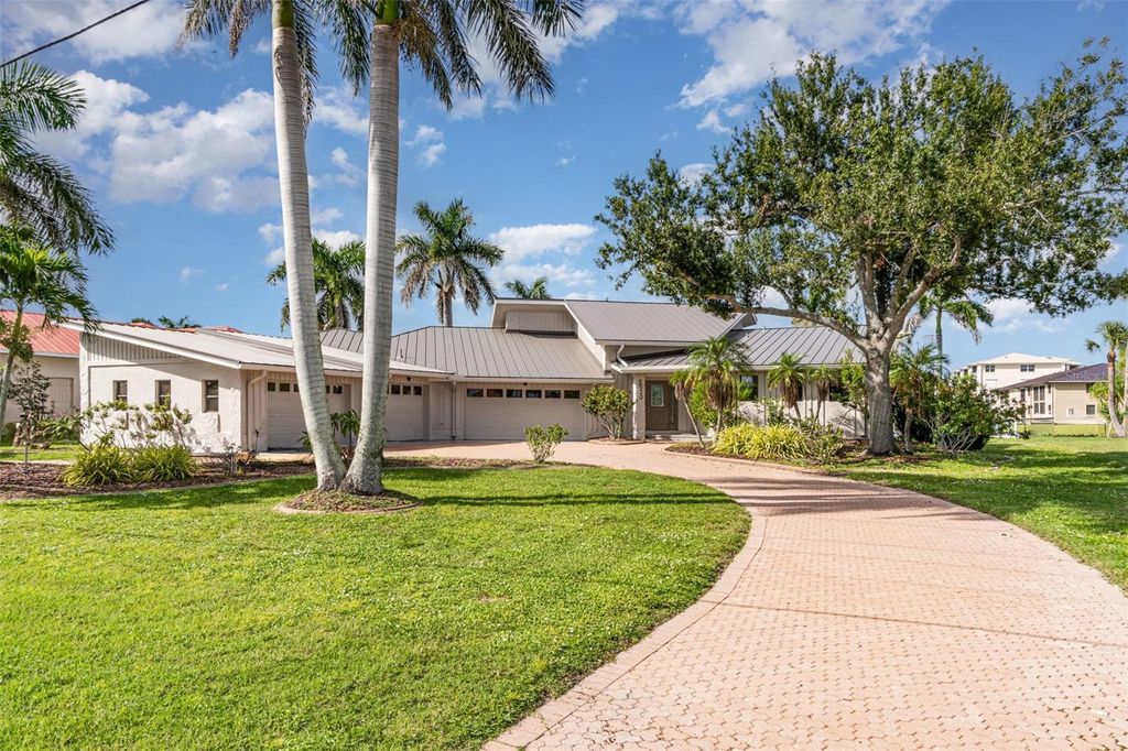 Photo of 1520 Columbian Drive, Punta Gorda, FL 33950 (MLS # TB8433180)